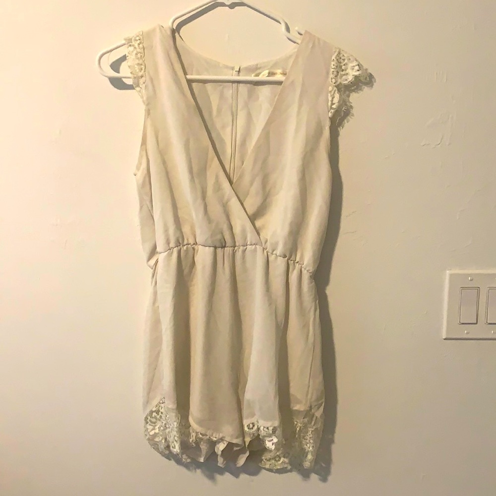 White/ cream romper with floral lace trimming
